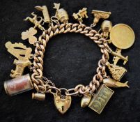 9ct gold bracelet with padlock clasp with 1915 full sovereign, 14 charms stamped 9ct & 3 charms