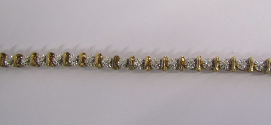9ct gold diamond tennis bracelet with illusion set stones - length 19.4cm - weight 6.6g - Image 4 of 14