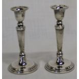 Pair of silver candlesticks with weighted bases, Birmingham 1993, maker Broadway & Co, 14.5cm high