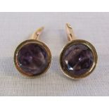 Pair of Amethyst & gold cufflinks marked 14k - Stone 1.2cm - total weight 7.6g