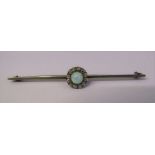 Tested as platinum bar brooch with opal and diamonds L 6.5 cm total weight 4.7 g