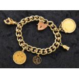 9ct gold charm bracelet with double loop links & heart shape padlock clasp with 1906 gold sovereign,