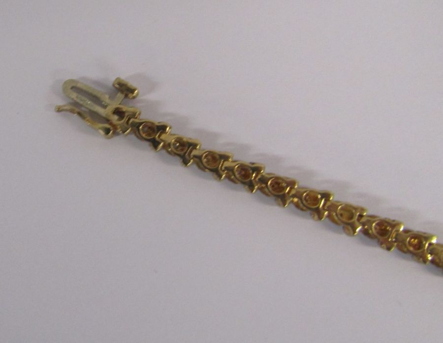 9ct gold diamond tennis bracelet with illusion set stones - length 19.4cm - weight 6.6g - Image 11 of 14