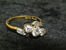 18ct gold & platinum diamond ring with 3 large centre stones 0.45ct & 2 x 0.2ct with diamond chips