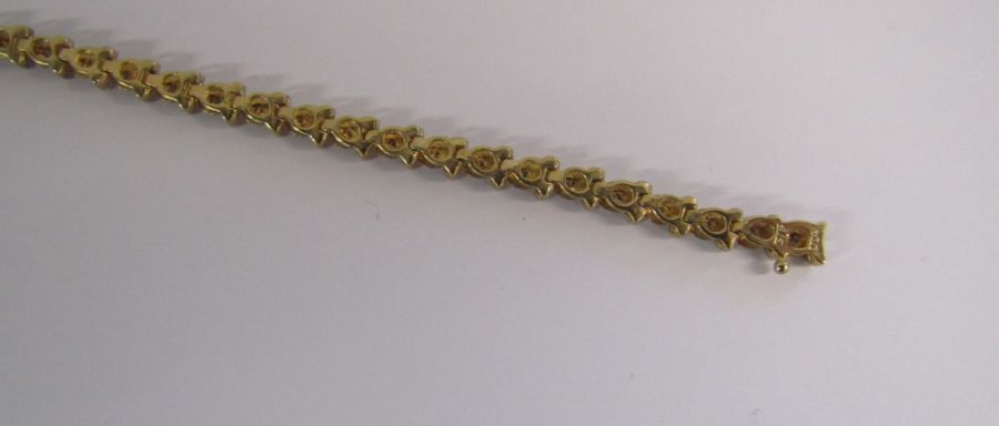 9ct gold diamond tennis bracelet with illusion set stones - length 19.4cm - weight 6.6g - Image 8 of 14