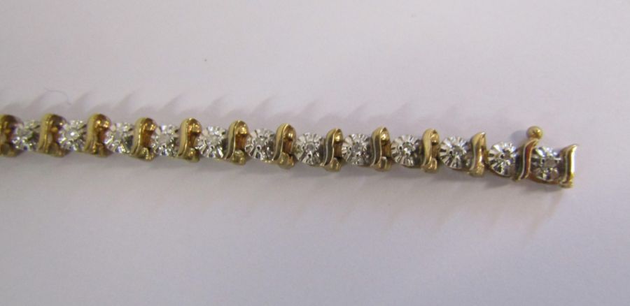 9ct gold diamond tennis bracelet with illusion set stones - length 19.4cm - weight 6.6g - Image 3 of 14