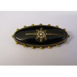 Tested as possibly 15ct gold black enamel and seed pearl mourning brooch with hair detail to reverse