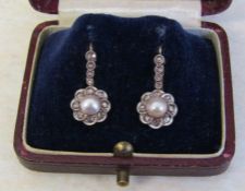 Tested at 14ct gold diamond chips and pearl earrings H 16 mm