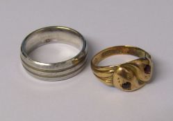 2 gents rings - 1 Bruno Banani silver ring - size U/V - total weight 0.28toz & gold and garnet gents