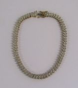 9ct gold diamond set tennis bracelet - length 19.2cm - total weight 10.8g