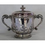 Large Edwardian silver two handled cup and cover with cut card work round base and cover,