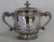Large Edwardian silver two handled cup and cover with cut card work round base and cover,