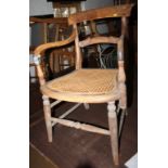 A 19th century fruitwood Oxford bar back chair with elm panel seat, on turned and stretchered