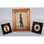 An early 19th century cut paper silhouette of an unknown gentleman, 4 3/4" x 7 1/4", in maple frame,