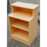 A pair of painted bedside shelves/cabinets