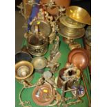 An assortment of metalware, including a pair of door knockers, a gong, a gilt metal clock, 12" high,