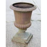 A cast iron campana urn, 22" dia x 31 1/2" high