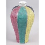 A Chinese octagonal meiping vase, decorated monochrome coloured sides with a scale finish, 12 1/2"