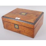 A walnut and ebony jewellery box with brass inset, 12" wide x 9 1/4" deep x 5" high