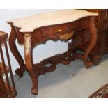 A 19th century Italian walnut serpentine shape marble top centre table, fitted one drawer, on scroll