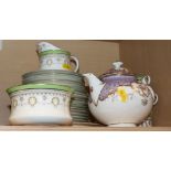 A Cauldron green bordered gilt and wreath decorated part teaset and a Coalport floral decorated