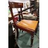 A set of six early 19th century mahogany standard dining chairs with bar backs and leather drop-in