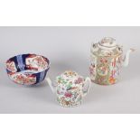 A famille rose teapot, decorated figures, flowers and birds with matched lid, 7" high, another