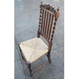 A 19th century grained as rosewood bar back carver chair with drop-in seat, a pair of Victorian