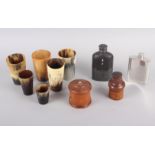 Six horn beakers, a boxwood cased ink bottle, 3 1/2" high, another boxwood and mother-of-pearl inset