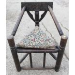 A 19th century Welsh turned and carved turner's chair with triangular panel seat, 21 1/2" wide