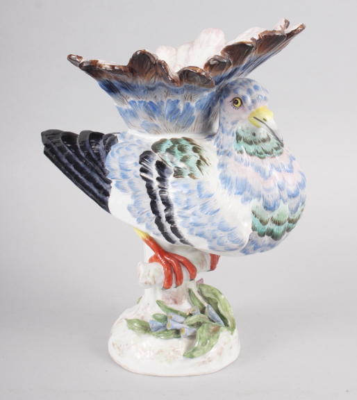 A Continental porcelain model of an exotic bird, 9 1/2" high