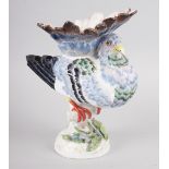 A Continental porcelain model of an exotic bird, 9 1/2" high