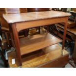 A vintage AB Seffle Mobelfabrik teak two-tier tea trolley with inlaid detail around the tray