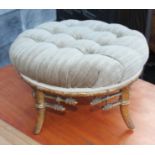 A 19th century bamboo turned frame circular topped low stool, button upholstered in a corded fabric,