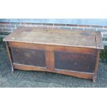 An oak and elm coffer chest of 17th century design with panel end supports, 30" wide x 18" deep x