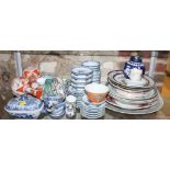 A pair of Satsuma sprinkler vases, 7 1/2" high, a quantity of blue and white tea bowls, a ginger jar