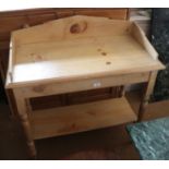 A waxed pine tray top two-tier washstand, on turned supports, 36" wide x 17" deep x 38" high