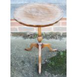 A polished as walnut wine table, on tripod splay supports, 15 1/2" dia x 20 1/2" high, and a