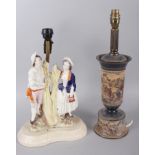 A Staffordshire figure group table lamp, in the form of two harvesters, 17" high (cracked), and