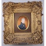 An early 19th century oval portrait miniature on ivory of an unknown gentleman, 2 3/4" x 2 1/4",