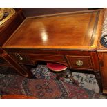 A mid 19th century mahogany and satinwood banded washstand with lift-up top and fitted interior,