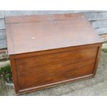 A mahogany slop top blanket box with brass carry handles, 51" wide x 25" deep x 36" high