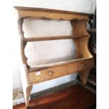 A waxed pine open wall shelf, fitted two drawers, 35" wide x 9" deep x 36" high