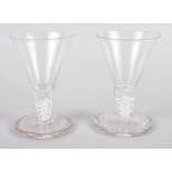 A pair of cotton twist stemmed firing glasses, 4 1/2" high (chip to rim)