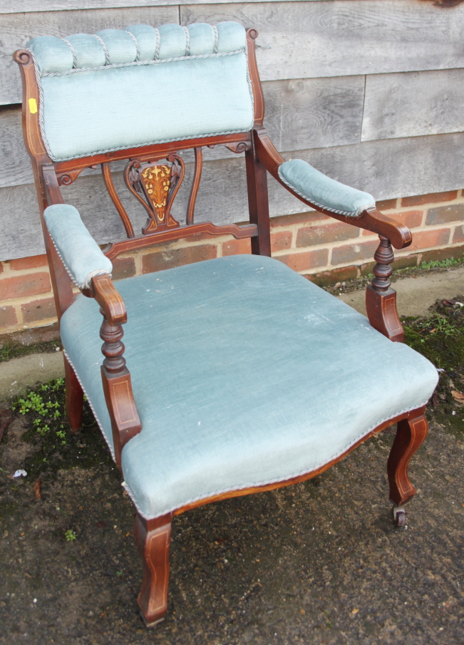 A late 19th century mahogany and inlaid open armchair with pierced panel splat back, upholstered