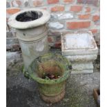 A cast stone chimney, 21" high, a square relief decorated planter and another similar circular