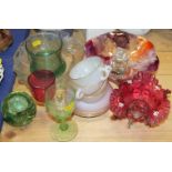 A Victorian cranberry glass table centre, an iridescent shell-shaped table centre, a paperweight,
