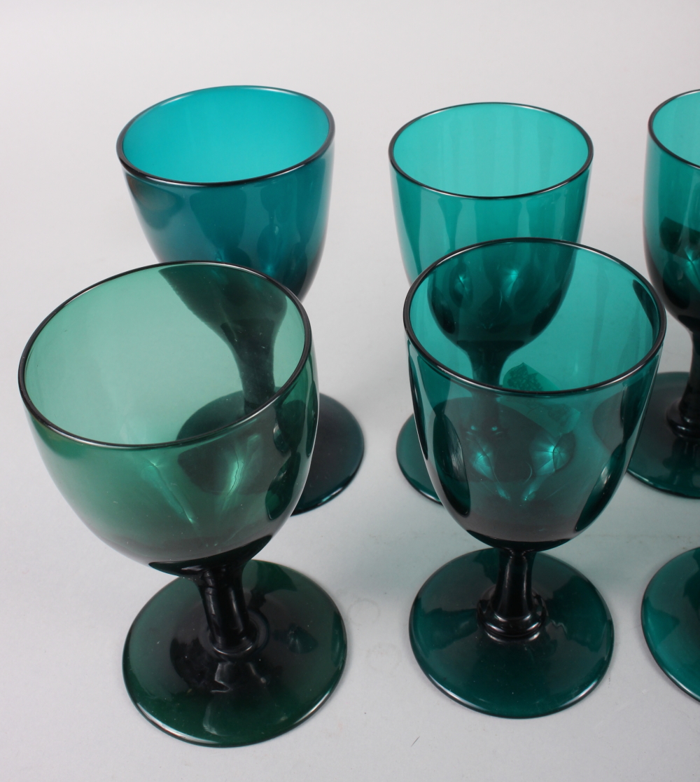 A set of six 19th century green glass conical wines, an early 19th century green glass rum - Image 2 of 5