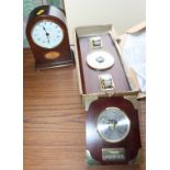 A mahogany and inlaid cased mantel clock by Knight & Gibbons, 8" high, and two wall mounted