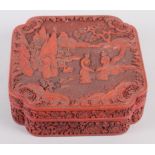 A Chinese carved cinnabar lacquered box, decorated figures in a garden